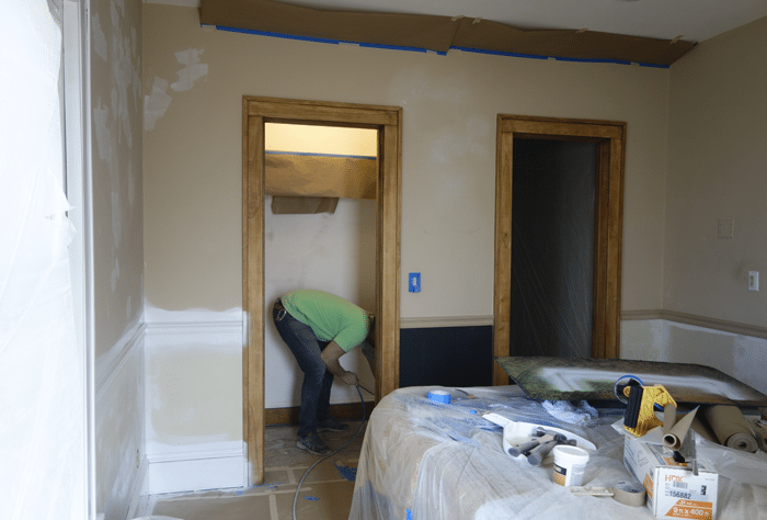 Spraying the closet with primer